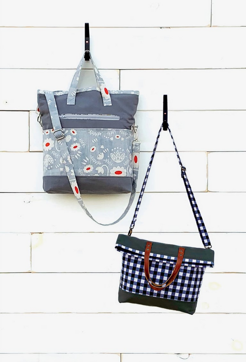 Two handbags on a white wooden surface, one with floral pattern and the other with checkered pattern.