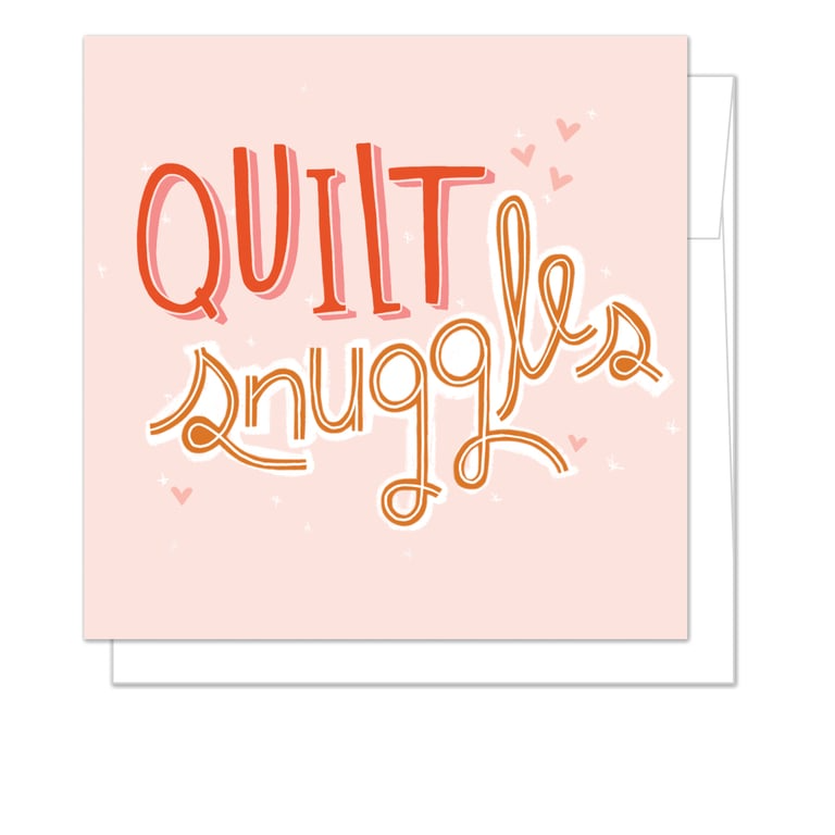 Greeting card with 'Quilt Snuggles' text on a pink background