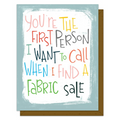 Card with colorful text on a light blue background