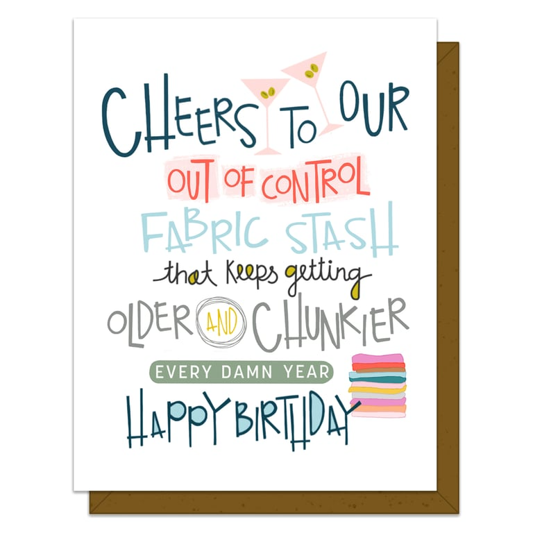 Birthday card with colorful text and a fabric roll illustration on a white background