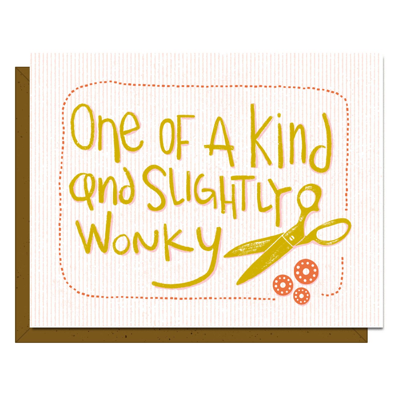 Card with yellow text 'One of a Kind and Slightly Wonky' and a pair of scissors on a white background.