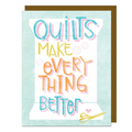 Card with colorful text 'Quilts make everything better' on a light blue background