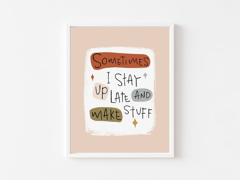 Framed print with motivational quote on a beige background