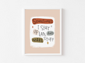 Framed print with motivational quote on a beige background
