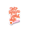 Sticker with 'Sleep Deprived Sewing Ninja' text and sewing needle design on a white background