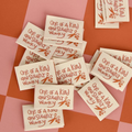 Multiple small cards with text and graphics on a patterned background