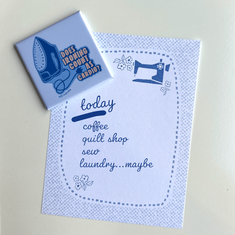Two blue and white cards with sewing-themed text and graphics on a light gray background.