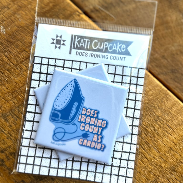 Kati Cupcake product with blue iron graphic and text on a grid background