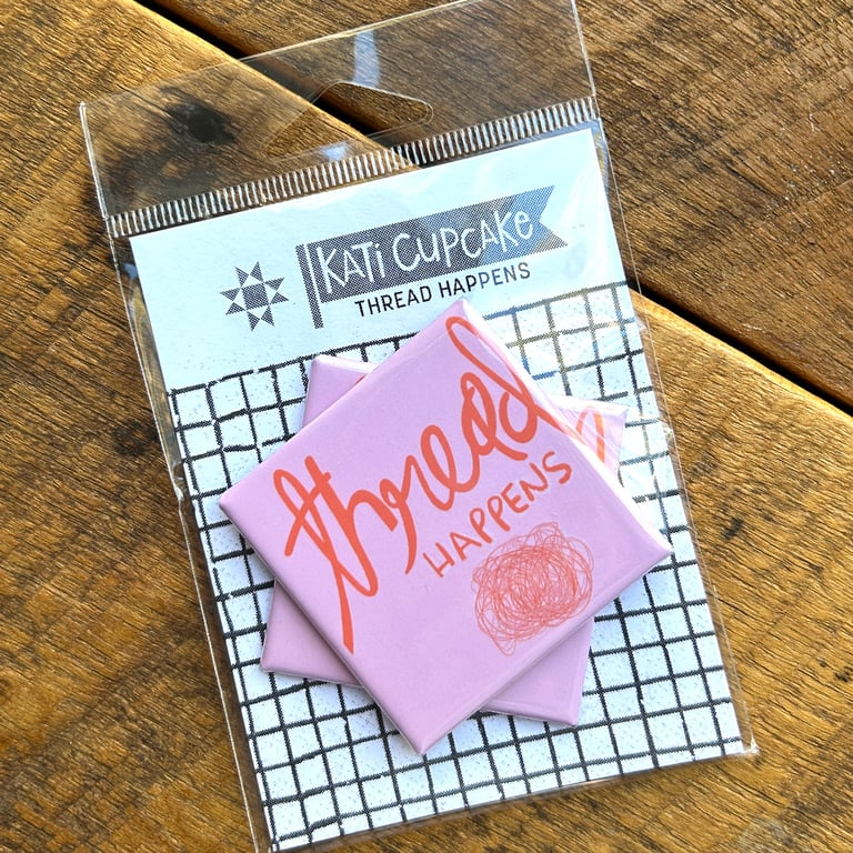 Kati Cupcake thread packaging with pink labels on a wooden surface